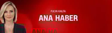 a woman in a black suit and a red background