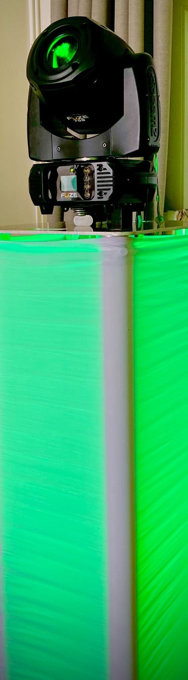 a green and white light on a table