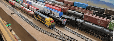 Pichacho Yard in Phoenix, Multiple trains parked decorated for Christmas.