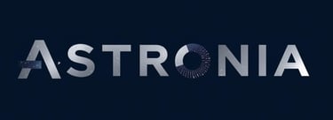 The word Astronia in silver foil foil with a dark background