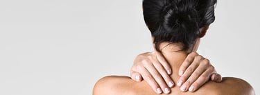 a woman with a back pain pain