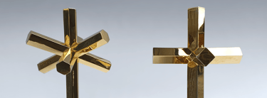 In Hoc Signo, the gilded, geometric bronze sculptures by Byrga Geniht