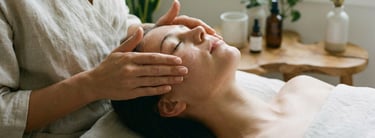 a woman is getting a facial massager