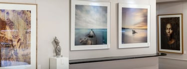 Interior of Osner Gallery in Hout Bay, featuring fine art photography, original artworks, by Martin and Samantha Osner