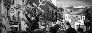 a women holding a banner in a strike