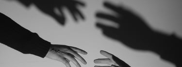 hands reaching for each other