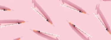 sitinges on pink background