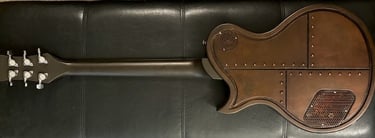 Ironbrand Les Paul style dark industrial guitar. Full back view.