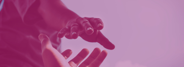 a person holding a microphone in their hands