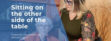 A female caregiver assisting an elderly woman in a wheelchair for senior care support.