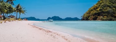 Pristine sandbar and turquoise waters in Balabac – the ultimate Palawan island expedition.