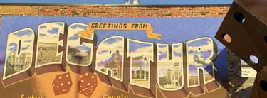 Decatur mural that says "Greetings from Decatur Texas. Eighter from Decatur. County seat of Wise."