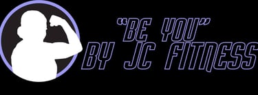 a man in a black shirt and a black and white sign that says be your