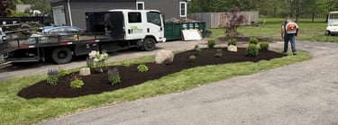 Professional lawn edging, detailing, and mulch bed maintenance service for residential properties.