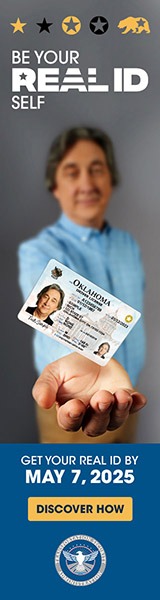 a person holding a card with a picture of a person
