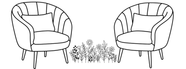 Due poltroncine con al centro una fioritura, psicoterapia in presenza