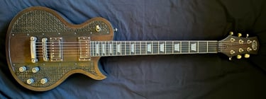 Ironbrand Les Paul style dark industrial guitar. Full front view.