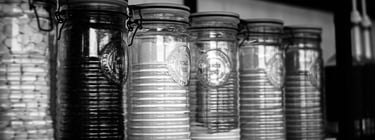 black-and-white glass jars