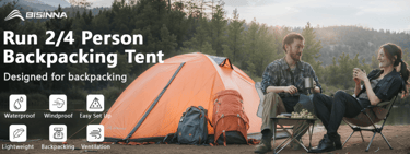 a man and woman sitting in chairs with a tent