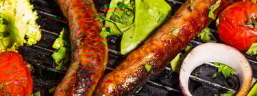 Sustainable plant-based, nutritionally-dense, hypoallergenic protein and fibre sausages with vegetables surrounding