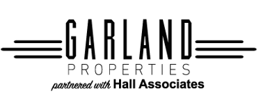 a logo for garland properties