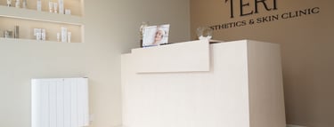 Inside Teri Aesthetics & Skin Clinic in Bocking, Essex, showing reception area and skincare products