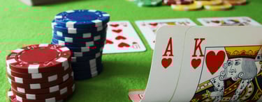 Ace and King of hearts, poker chips