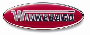 Official Winnebago logo badge in red and silver for RV branding and motorhome identification.