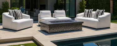 Elegant white sofa set by Solo Home Decor near a pool with striped pillows, showcasing a modern luxury backyard design.