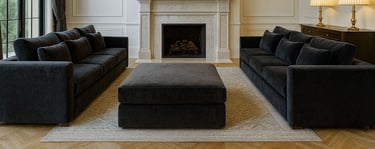 Elegant living room with two navy sofas by Solo Home Decor