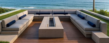 Modern gray sectional with fire pit in a luxury ocean-view backyard, custom outdoor furniture by Solo Home Decor.