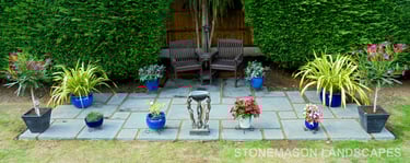 Replica antique stone grey paving slabs patio kit with bench and flowers