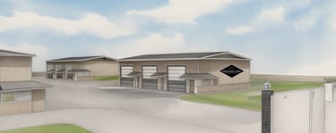 Rendering of driving into Diamond Garage Condos showing buildings with garage doors and eves over