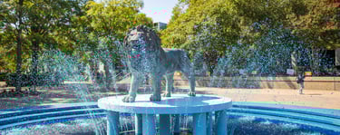 A statue of the Old Dominion Lion in a fountain
