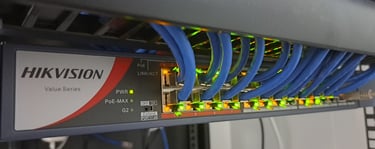 a rack of wires and wires connected to a computer