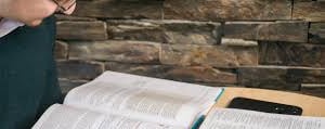 Man reading and studying the Holy Bible