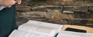 Man reading and studying the Holy Bible