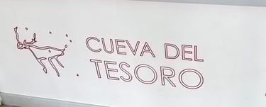 Text: Cueva del tesoro