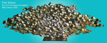 a zinc plated steel sculpture of a school of fish 