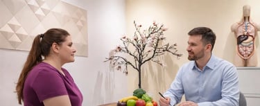 a man and woman sitting at a table
