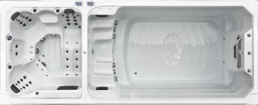 a hot tub with a white tub and a black and white tub