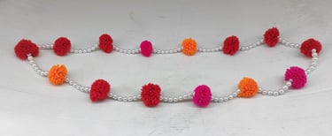 "Handcrafted artificial tribal-style necklace with multicolor flower embellishments-for global markets"
