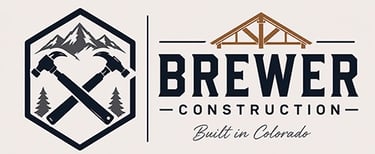 Brewer Construction logo with crossed hammers, mountains, and Built in Colorado tagline for Denver area contracting.