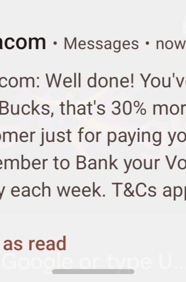 A mobile phone notification from Vodacom detailing VodaBucks rewards earned for paying a monthly bill.