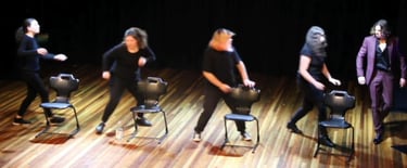 a group of people standing on a stage