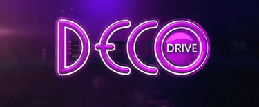 a neon purple neon sign that says disco drive