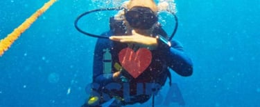 Scuba Duka Diani Beach Kenya diving center gift voucher featuring a scuba diver underwater and SSI Marine Ecology course