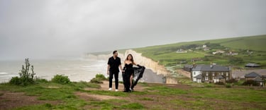 Couple walking along seaside White Cliffs – romantic outdoor photoshoot in Kent by Fred Art Studio