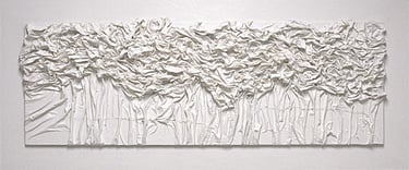 White 3D textured fabric wall art featuring vertical folds and crumpled abstract patterns.