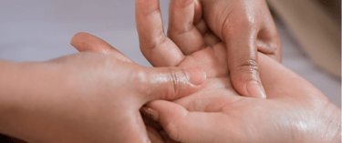 Massaging a hand